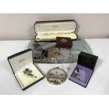 A cut glass tray of various costume jewellery, dress rings,