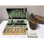 A leather travel case containing decanter, flask and glasses, cased set of cutlery,