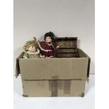 A box of doll's and furniture, plastic modelling kit, RC car,