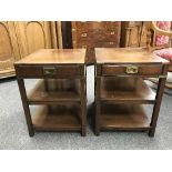 A pair of mahogany and brass-mounted lamp tables, each fitted with a drawer, width 46 cm.