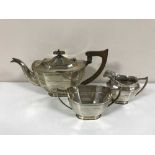 A silver three piece tea service, Cooper Brothers & Sons Ltd, Sheffield 1932, 36.