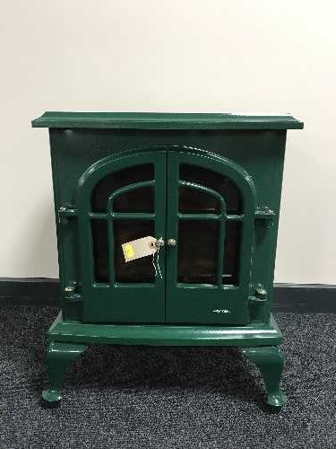 A Warmlite electric fire in the form of a stove