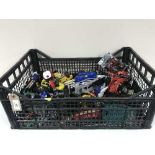 A crate of assorted die vehicles