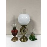 Three oil lamps