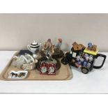 A tray of Ringtons teapot, Leonardo figures on wooden bases, two boxed oriental scent bottles,