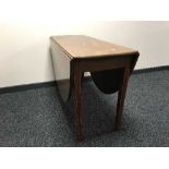 An inlaid mahogany drop leaf table