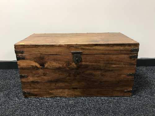 A pine blanket box with metal mounts