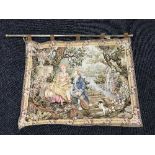 A hanging tapestry "lovers in a garden"