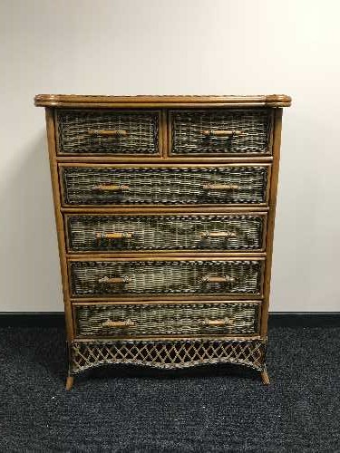 A bamboo and wicker six drawer chest