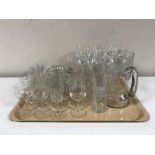 A tray of quantity of assorted lead crystal and etched drinking glasses