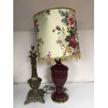 A decorative gilt metal lamp base together with a ceramic lamp with shade