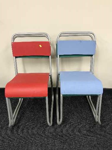 Four mid 20th century tubular metal stacking chairs