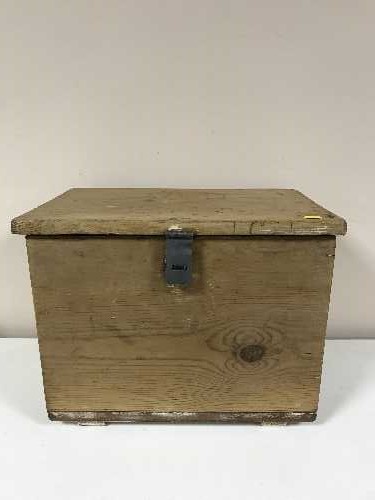 An antique stripped pine blanket box