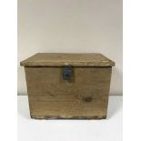 An antique stripped pine blanket box