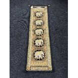A beaded Indian wall hanging depicting elephants