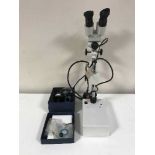 A medial microscope with accessories