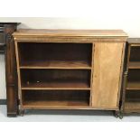 A set of mahogany open shelves