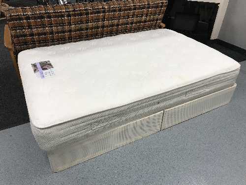 A memory foam 4' mattress and base