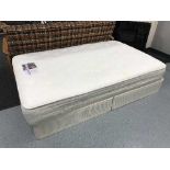 A memory foam 4' mattress and base