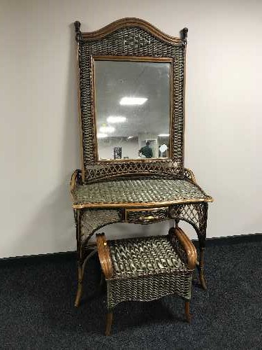 A bamboo and wicker dressing table with mirror and stool