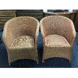Two wicker basket chairs and a coffee table