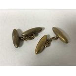 A pair of 15ct gold cuff links