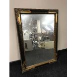 A gilt framed over mantel mirror