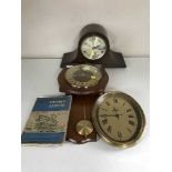 An oak mantel clock, two wall clocks,