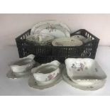 Four crates of German floral dinner service, plates of coaching scenes,