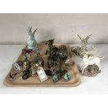 A tray of brass animal ornaments, figures of dragons, dragon belt buckle,