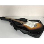 A Peavey Raptor Special electric guitar in carry bag