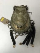 A brass Benin tribal tobacco pouch