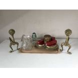 A tray of silver plated heart shaped mirrored stand, brass fire dogs, Victorian glass dump,