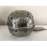 A continental silver metal spherical pierced casket