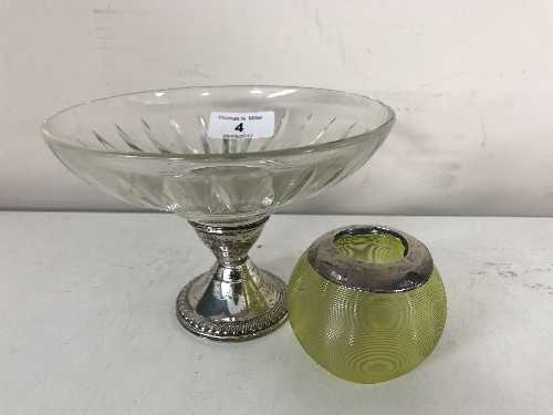 A sterling silver based glass comport and a silver topped match striker