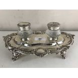 A silver plated desk stand