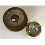 A ships barometer/thermometer and a ships clock signed Barigo