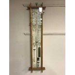 An Admiral Fitzroys oak framed barometer