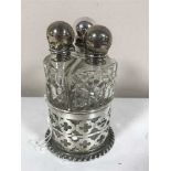 A silver three-part dressing table bottle set, Birmingham,