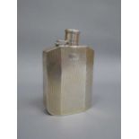 A silver hip flask, 186g, hinged lid a/f CONDITION REPORT: Cap needs re-pinning.