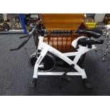 An Iron Man X1 racing exercise bike