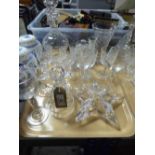 A tray of lead crystal candle holder, bell, decanter and stopper,