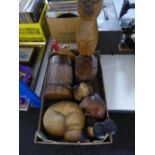 A box of wooden cat ornaments, candle holders,