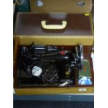 A cased Singer sewing machine