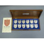 The Royal Arms - A collection of 12 sterling silver proof ingots,