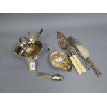 A silver plated sauce boat together with various cutlery, ivorine servers etc.