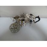 A three-piece Mappin & Webb silver plated tea service and a pottery china ink well