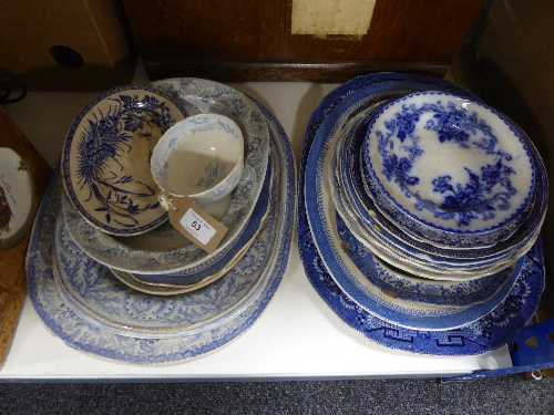 Twenty assorted blue and white meat and dinner plates in an oriental style and a similar teacup