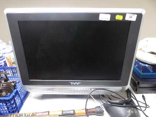 A TWF 19 inch LCD TV with remote and aerial