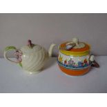 A Clarice Cliff lidded biscuit barrel and a Clarice Cliff teapot (2)